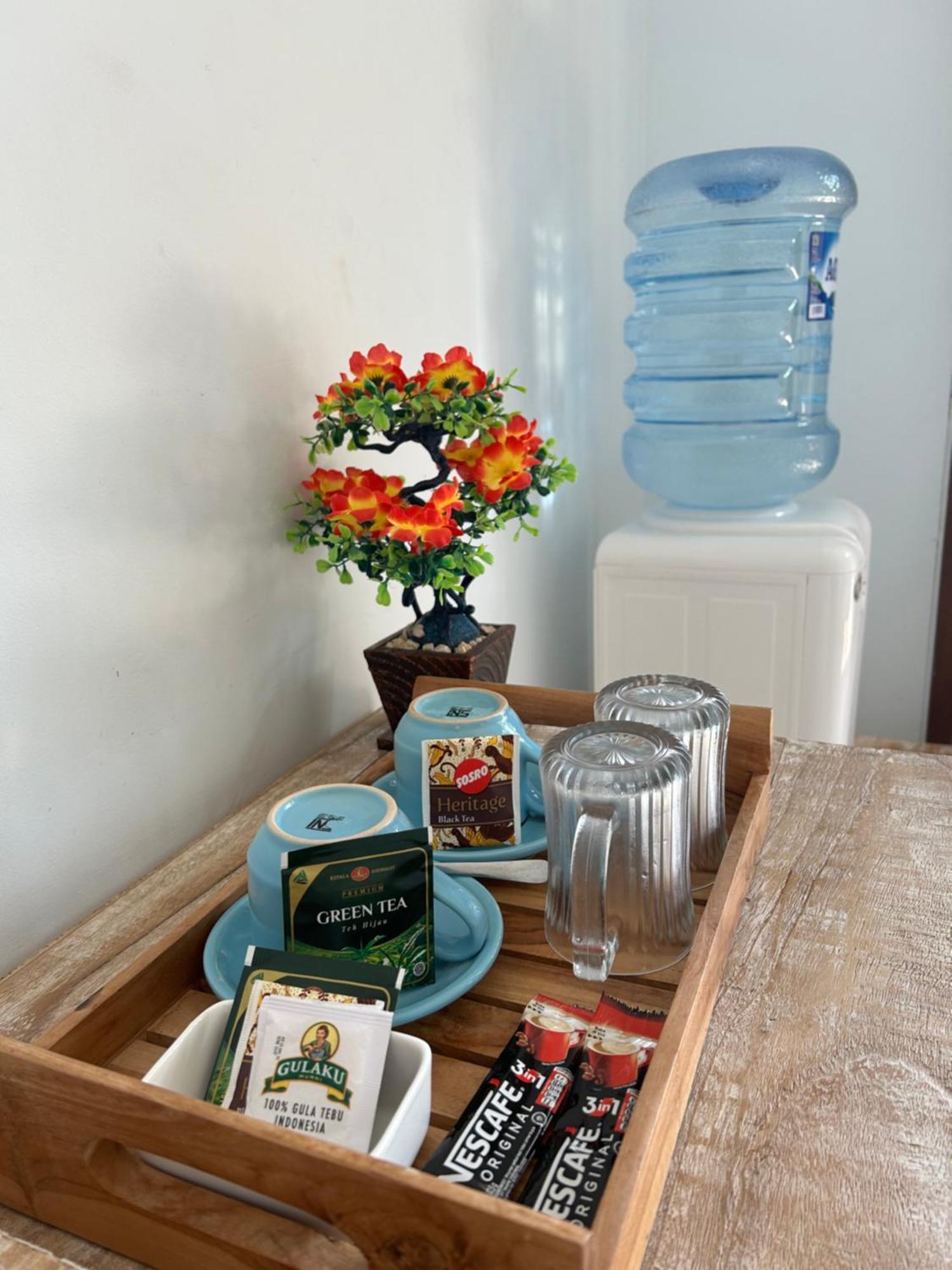 D'Uma Amed Homestay Buitenkant foto