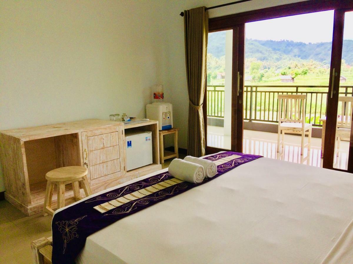 D'Uma Amed Homestay Buitenkant foto
