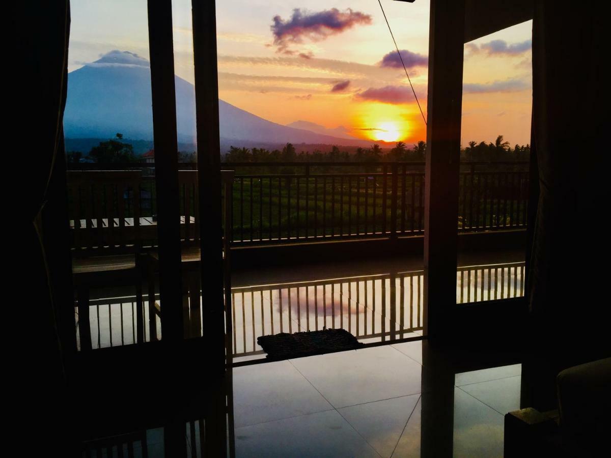 D'Uma Amed Homestay Buitenkant foto