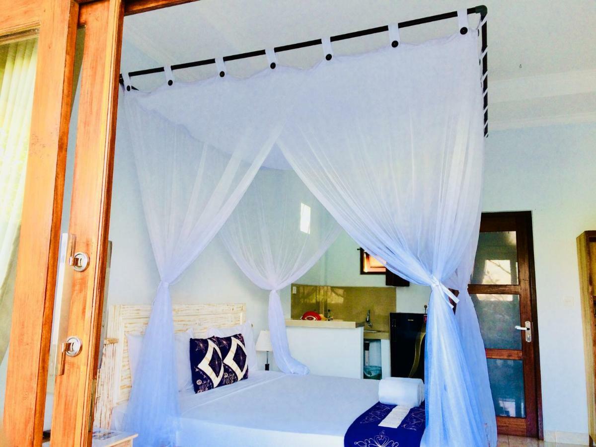 D'Uma Amed Homestay Buitenkant foto