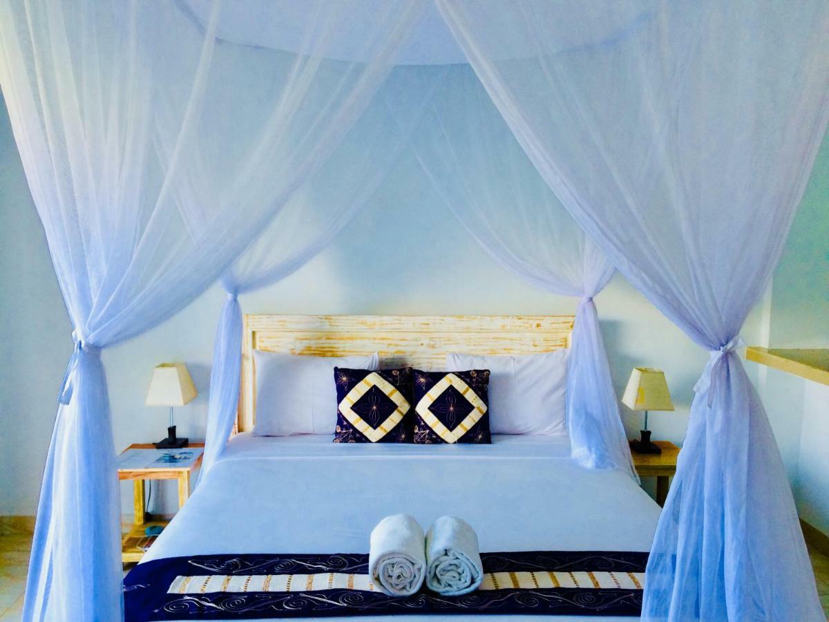 D'Uma Amed Homestay Buitenkant foto
