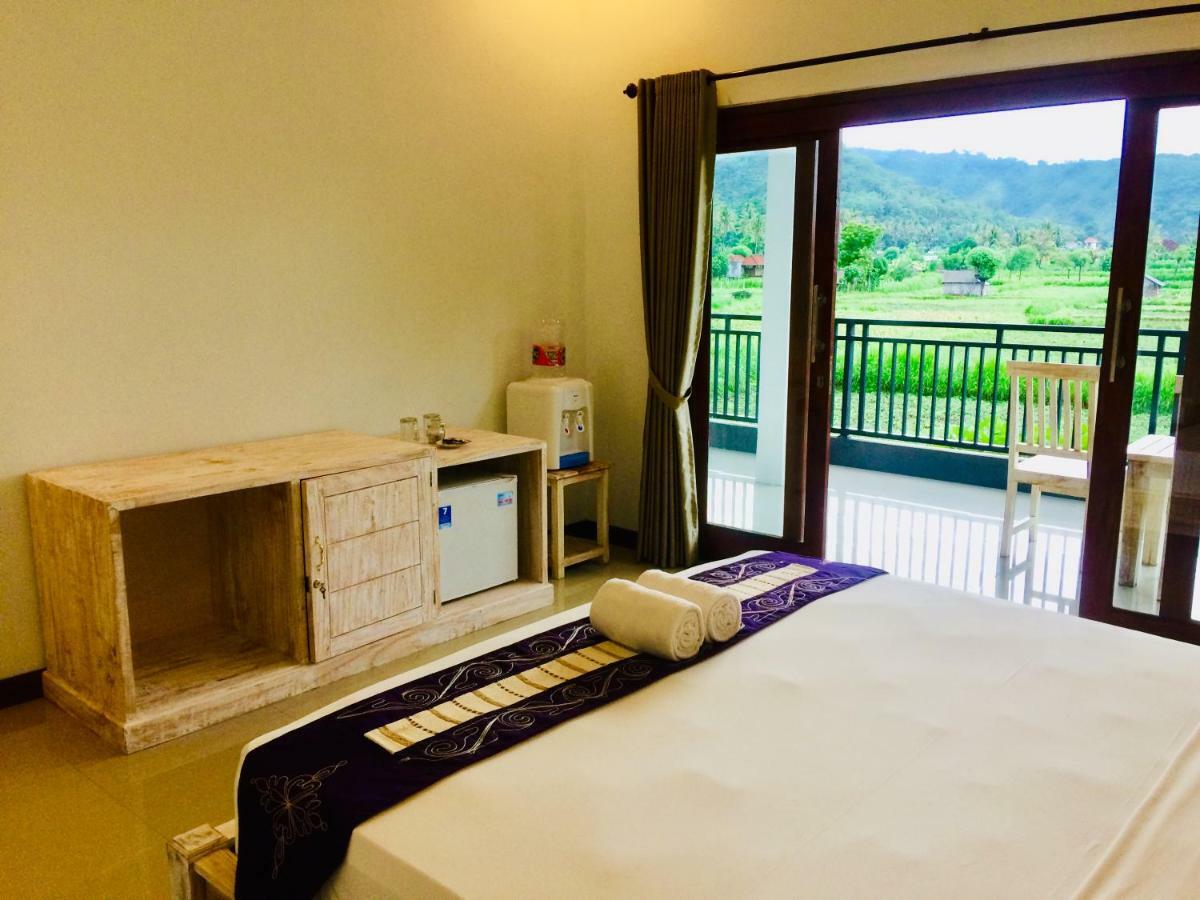 D'Uma Amed Homestay Buitenkant foto