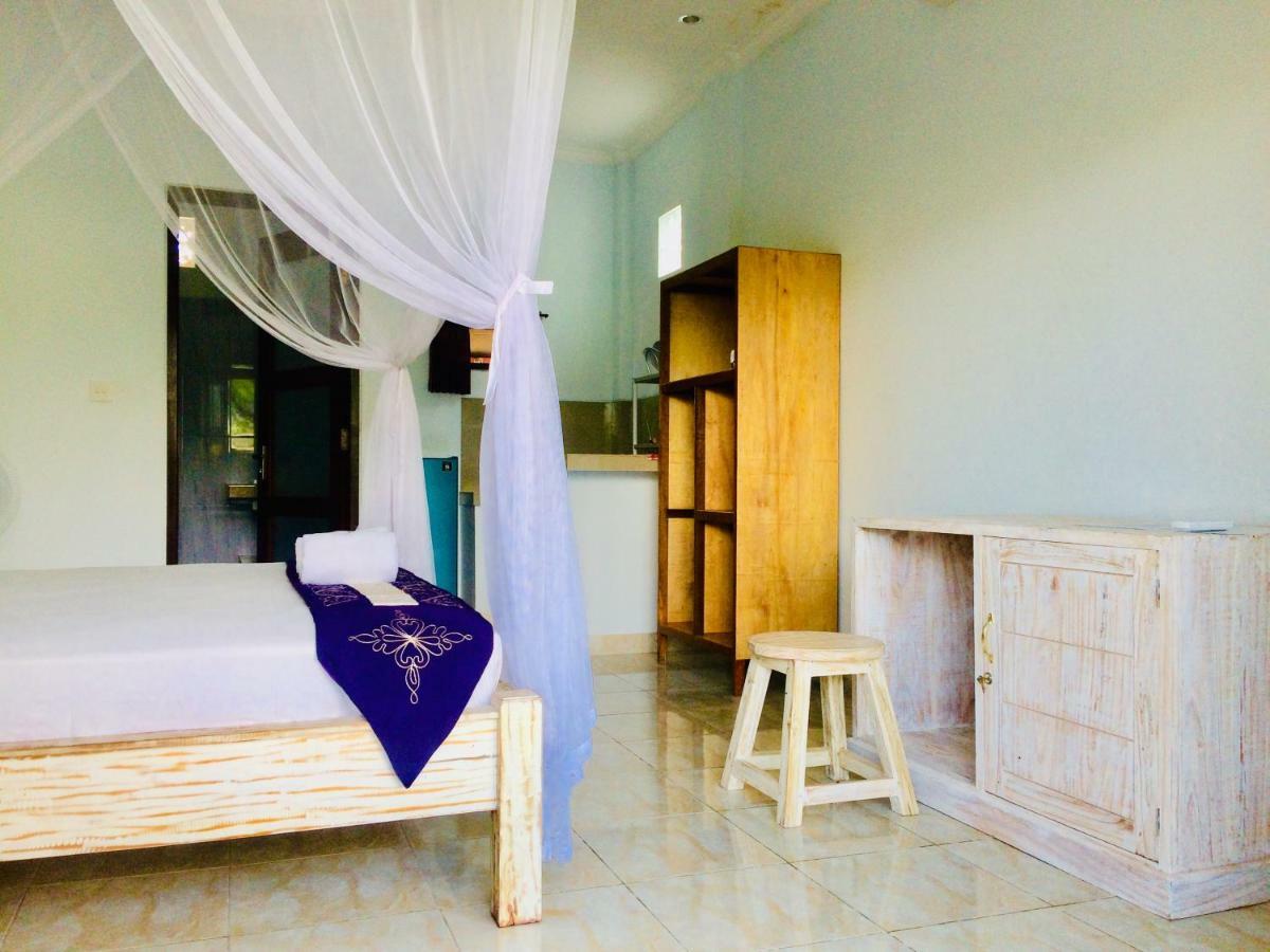D'Uma Amed Homestay Buitenkant foto