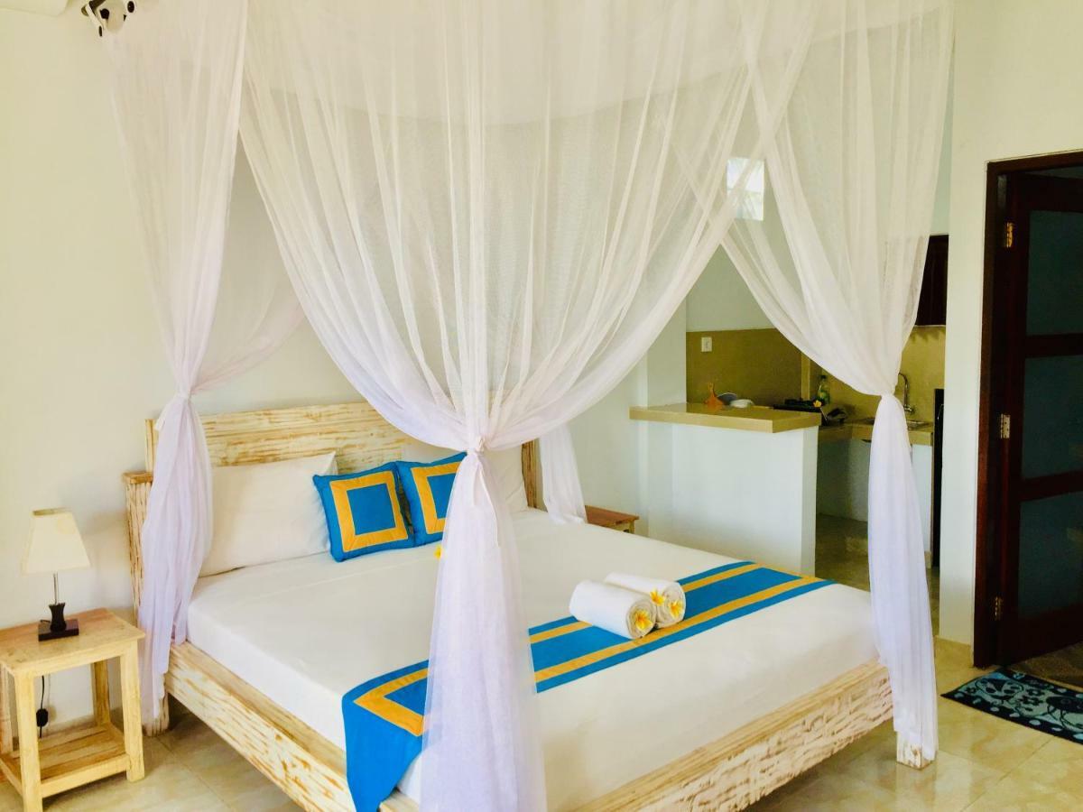D'Uma Amed Homestay Buitenkant foto