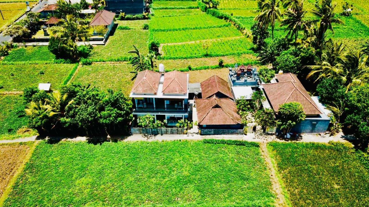 D'Uma Amed Homestay Buitenkant foto